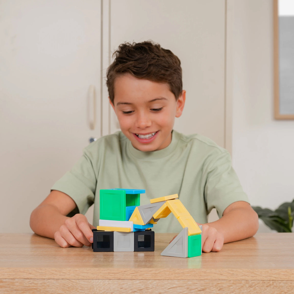 Child building with Connetix PRO Vehicles Pack