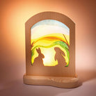 Ostheimer Rabbits Colour Silhouette lit by candle