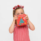 Child holding Connetix Christmas Tree Pack